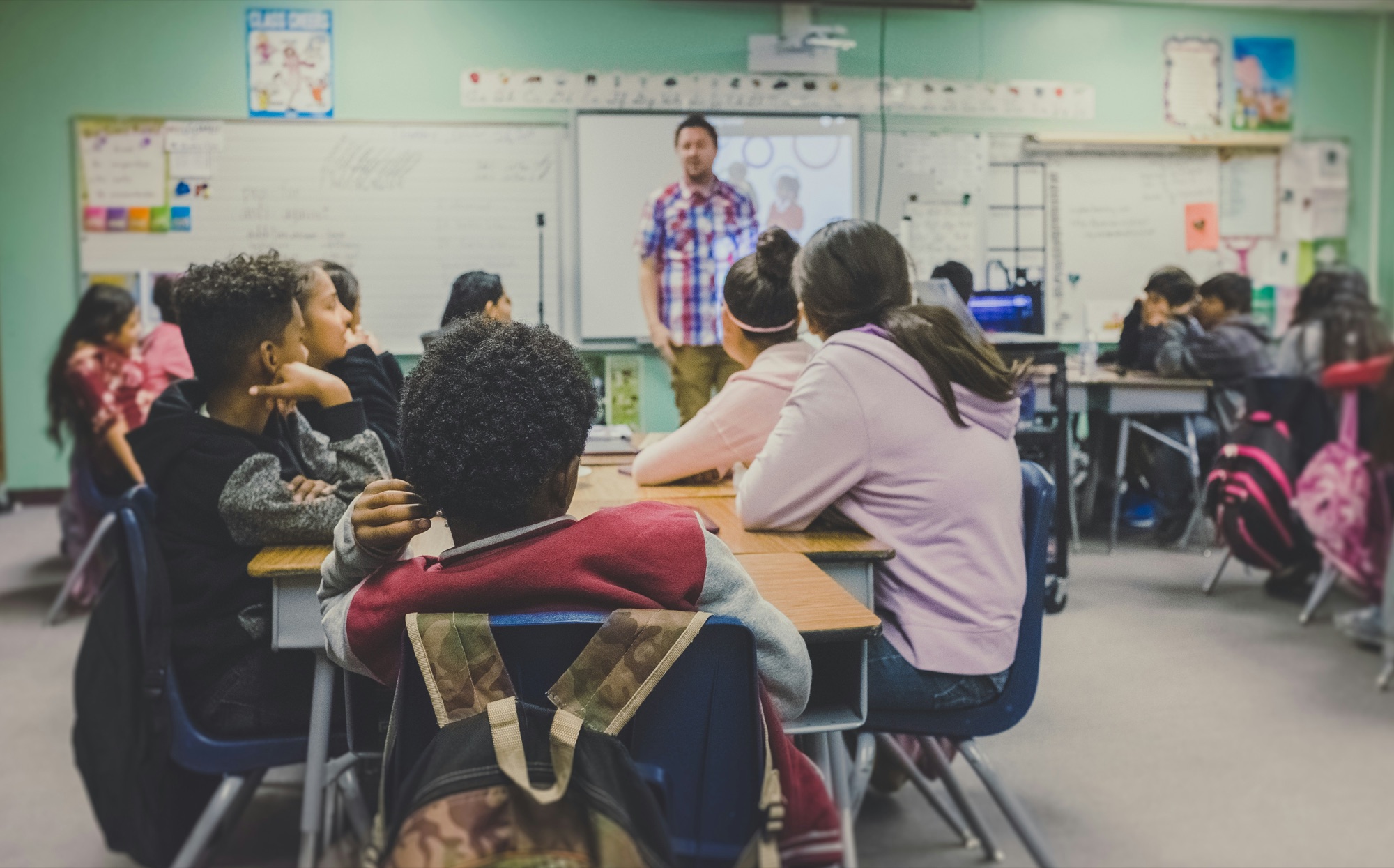 Students listening during a classroom discussion